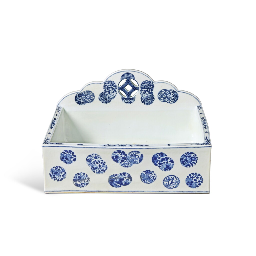 View full screen - View 1 of Lot 1035. A rare blue and white 'flower-balls' ash container, Seal mark and period of Tongzhi | 清同治 青花皮球花紋灰槽 《同治年製》款.