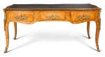 A LOUIS XV STYLE GILT-BRONZE MOUNTED TULIPWOOD BUREAU PLAT