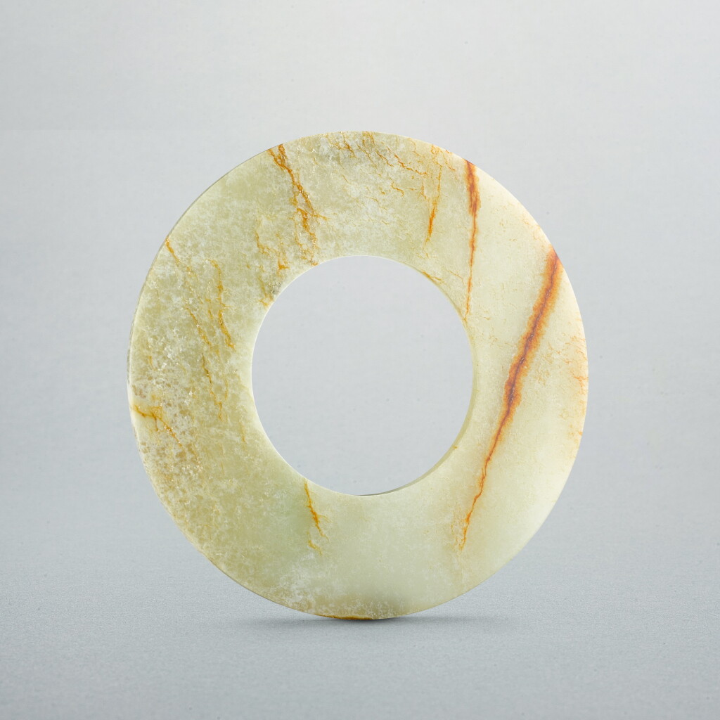 View full screen - View 1 of Lot 743. An inscribed white jade disc, huan, Western Han dynasty | 西漢 「小歐下十三」款素面白玉環.