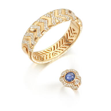 View full screen - View 1 of Lot 913. Sapphire and diamond ring and a gold and diamond bangle.