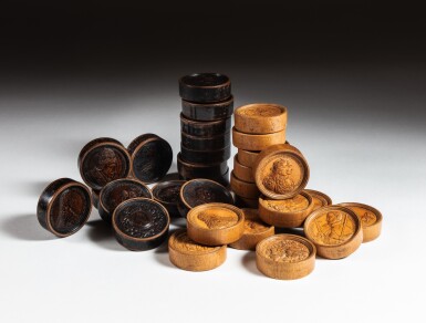 View full screen - View 1 of Lot 362. A set of thirty backgammon counters in maple and stained wood, Nuremberg, Germany, late 17th–early 18th century, some with the monogram of Martin Brunner.