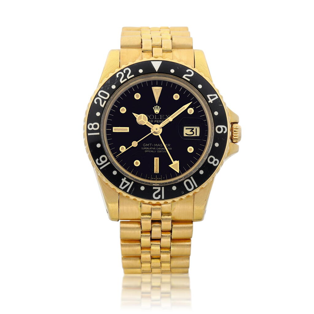 View full screen - View 1 of Lot 2243. GMT-Master, Reference 1675 | A yellow gold dual time zone wristwatch with date, nipple dial and bracelet, Circa 1978 | 勞力士 | GMT-Master 型號1675 | 黃金兩地時間鏈帶腕錶,備日期顯示及 nipple 錶盤,約1978年製.