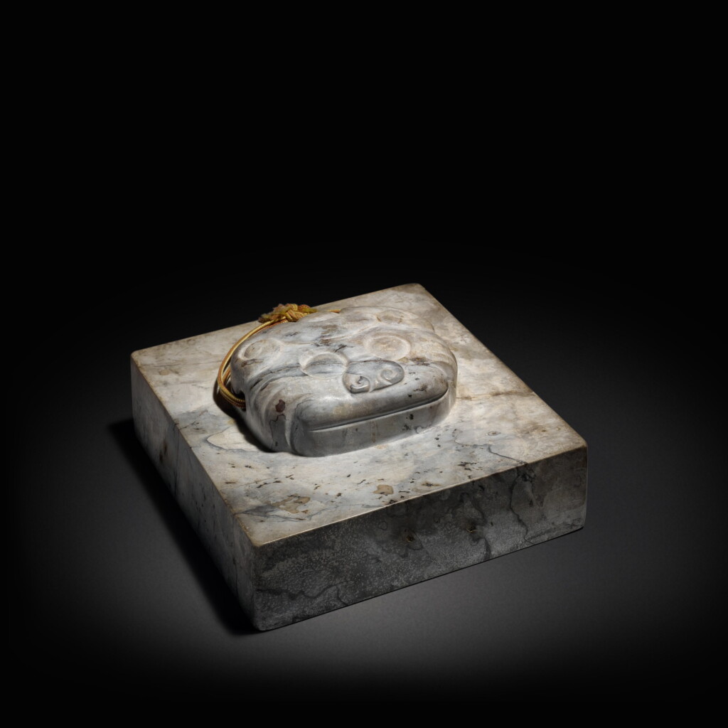 View full screen - View 1 of Lot 606. A large gray stone square seal, 20th century | 二十世紀 石雕獸面鈕印.