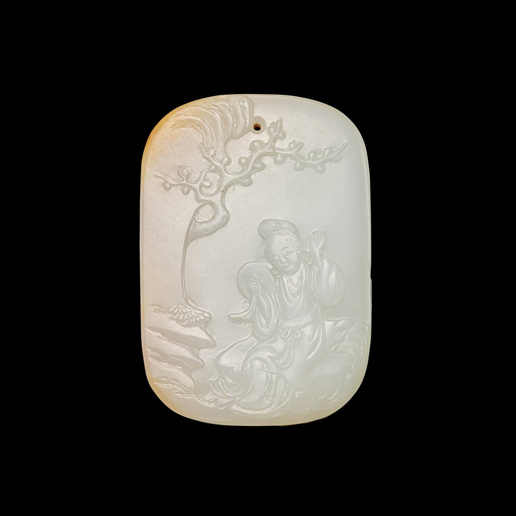 View full screen - View 1 of Lot 3705. A white and russet jade 'meiren' plaque, Qing dynasty, 18th century | 清十八世紀 白玉美人牌.