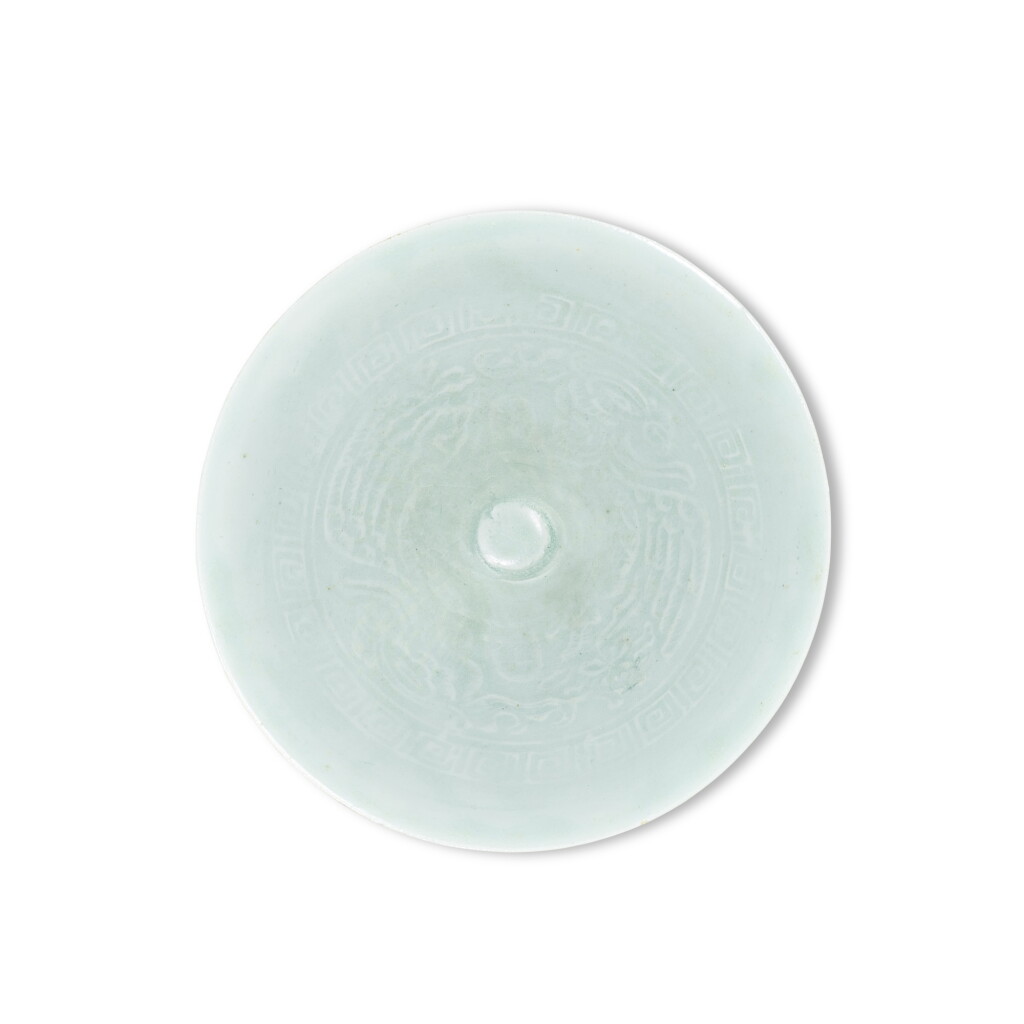 View full screen - View 1 of Lot 3463. A moulded qingbai 'phoenix' bowl, Southern Song - Yuan dynasty | 南宋至元 青白釉印雙鳳花卉紋斗笠盌.