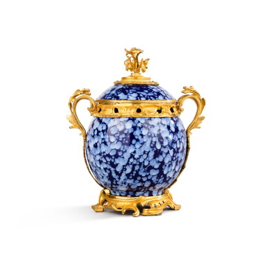 View full screen - View 1 of Lot 30. A gilt-bronze mounted Nevers faïence pot-pourri vase, the faïence first half 18th century, the mounts Louis XV, circa 1755.
