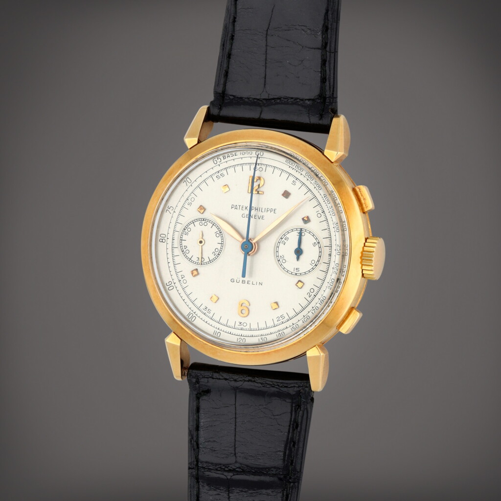 View full screen - View 1 of Lot 85. Retailed by Gübelin: 'Spider Lugs', Reference 1579 | A yellow gold chronograph wristwatch with fancy lugs | Made in 1955.