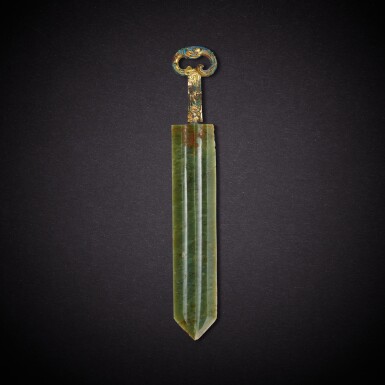 View full screen - View 1 of Lot 7847. A celadon jade dagger with gilt-bronze 'phoenix' hilt, Han dynasty | 漢 鎏金銅銜尾鳳鳥柄玉刀.