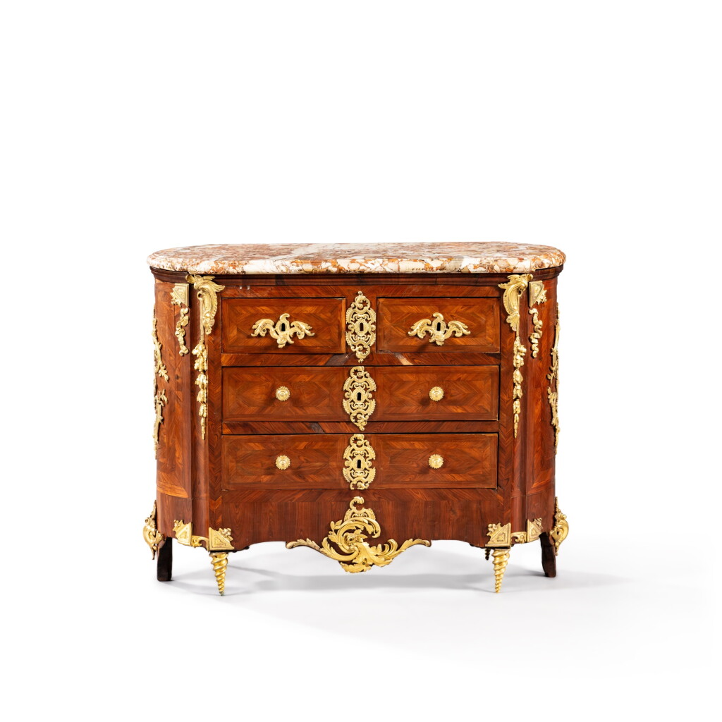 View full screen - View 1 of Lot 109. A rare Louis XIV gilt-bronze mounted kingwood veneered oval commode "en tambour arrondi par les deux bouts", circa 1715, attributed to the workshop of d’André-Charles Boulle | Rare petite commode ovale ou « en tambour arrondi par les deux bouts » en placage de bois de violette d’époque Louis XIV, vers 1715, attribuée à l’atelier d’André-Charles Boulle.