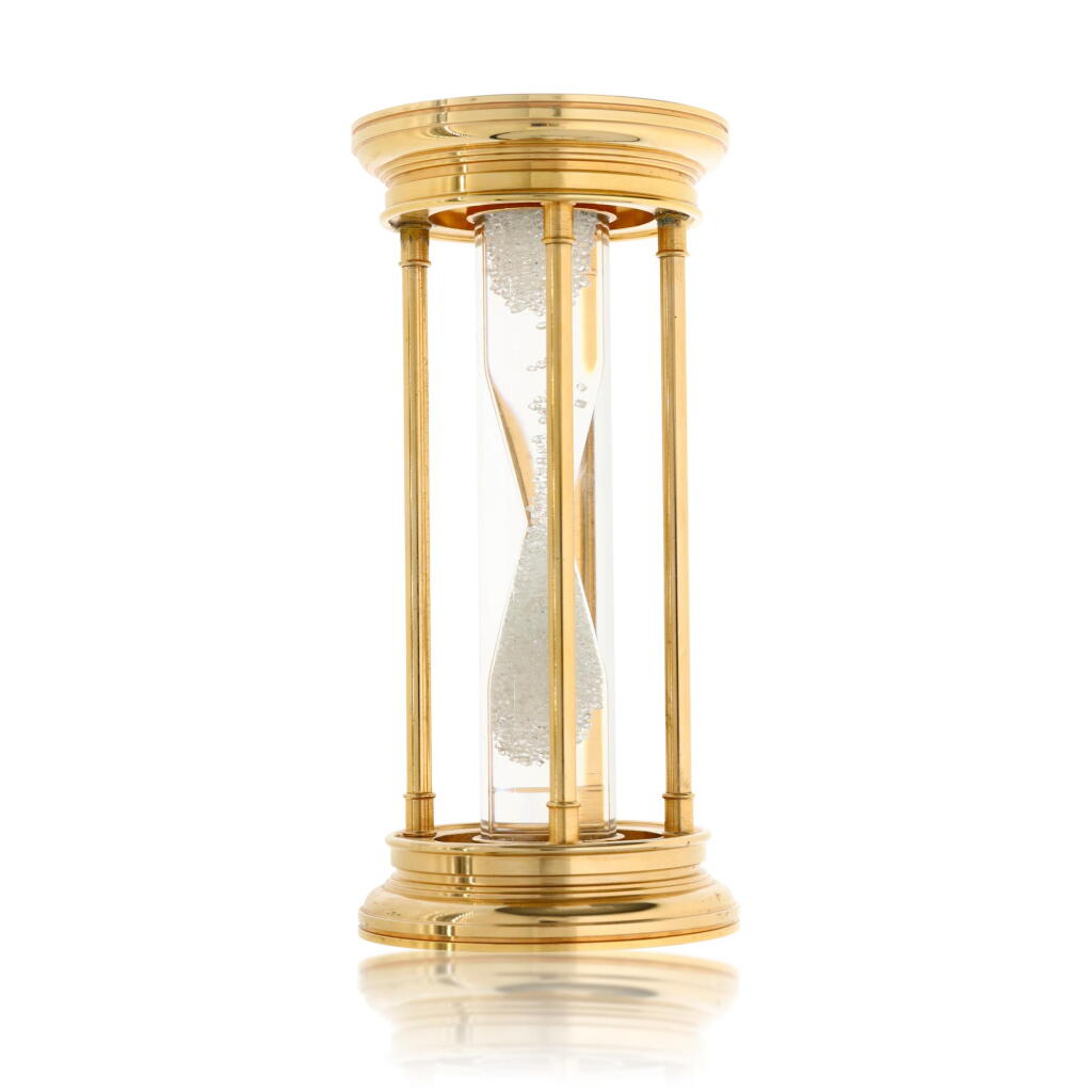 View full screen - View 1 of Lot 175. A gilt brass hourglass with floating diamonds, Circa 2000.