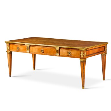View full screen - View 1 of Lot 20. Royal: A Louis XVI tulipwood and amaranth bureau-plat, circa 1780, attributed to Claude-Charles Saunier.