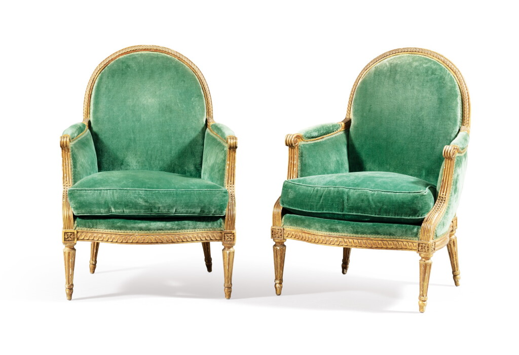 View full screen - View 1 of Lot 119. A pair of Louis XVI gilt-wood bergères, stamped I.POTHIER | Paire de bergères en bois redoré d'époque Louis XVI, estampillée I. POTHIER.