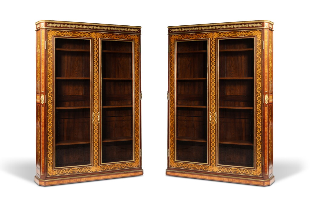 View full screen - View 1 of Lot 56. A pair of Louis XVI gilt-bronze mounted tulipwood, kingwood and amaranth bibliothèques, circa 1774, stamped by Nicolas Petit | Paire de bibliothèques en bois de rose, bois de violette, amarante et bronze doré d'époque Louis XVI, vers 1774, estampille de Nicolas Petit.