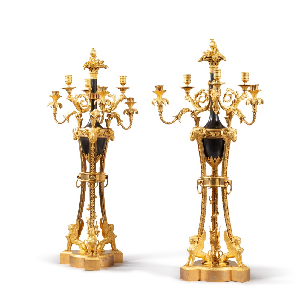 View full screen - View 1 of Lot 78. A pair of Louis XVI six-light candelabra, circa 1785, attributed to Pierre-Philippe Thomire.
