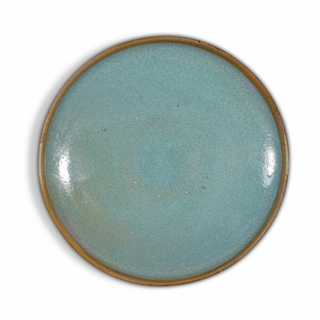 View full screen - View 1 of Lot 730. A 'Jun' blue-glazed dish, Song - Yuan dynasty | 宋至元 鈞窰天藍釉盤.