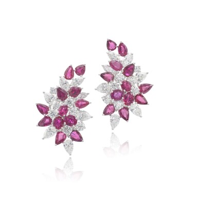 View full screen - View 1 of Lot 910. Pair of ruby and diamond ear clips.