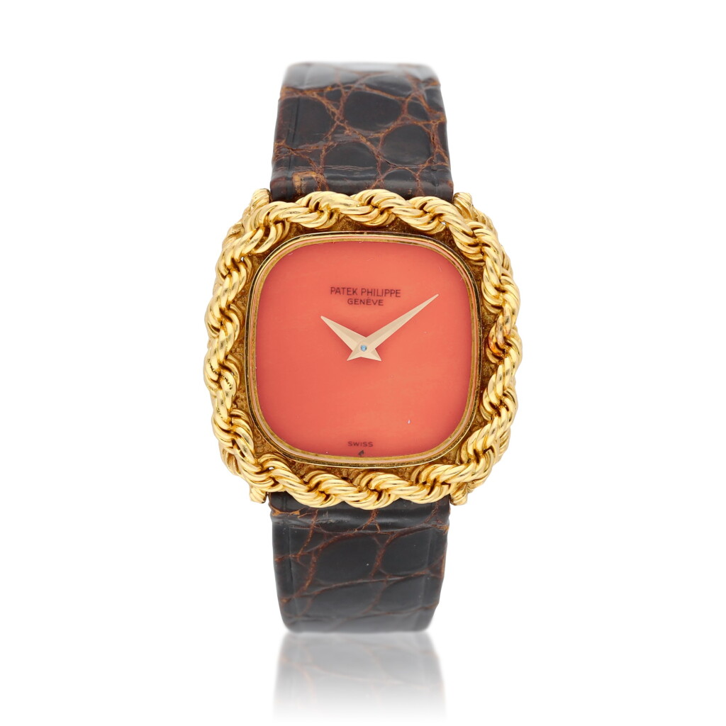 View full screen - View 1 of Lot 89. Reference 4444 An unusual manual winding 18k yellow gold wristwatch with a coral dial, circa 1975.