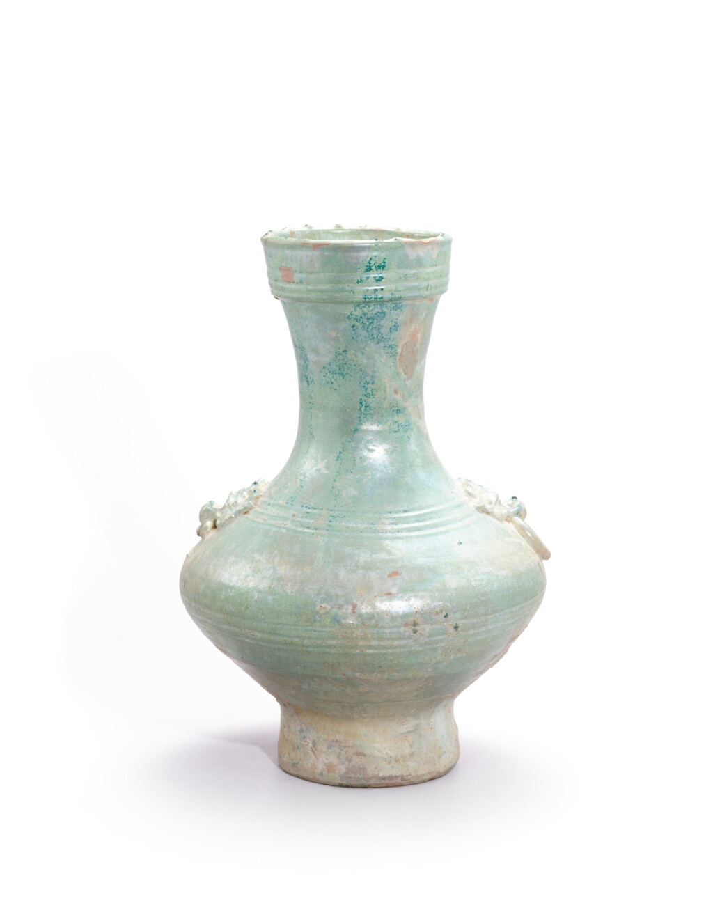 View full screen - View 1 of Lot 5137. A green-glazed 'mask' vase, Eastern Han dynasty | 東漢 綠釉舖首耳壺.