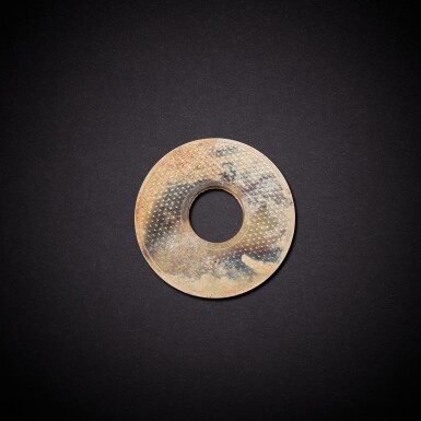 View full screen - View 1 of Lot 7877. A celadon jade disc, bi, Western Han dynasty | 西漢 青玉蒲紋璧.