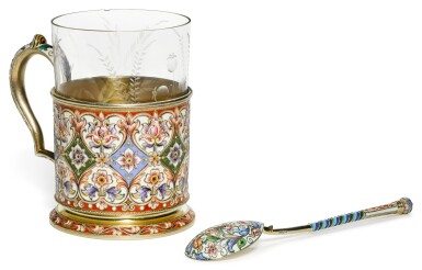 View full screen - View 1 of Lot 155. A silver gilt and cloisonné enamel tea glass holder and a spoon, Feodor Rückert, Moscow, 1899-1908, retailed by Ovchinnikov.