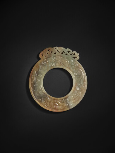 View full screen - View 1 of Lot 210. An extremely rare and important archaic green jade 'chilong' disc (Bi), Han dynasty | 漢 玉螭龍紋璧.