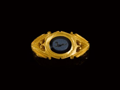 View full screen - View 1 of Lot 257. A Roman Gold Ring with Nicolo Intaglio, circa 3rd Century A.D..