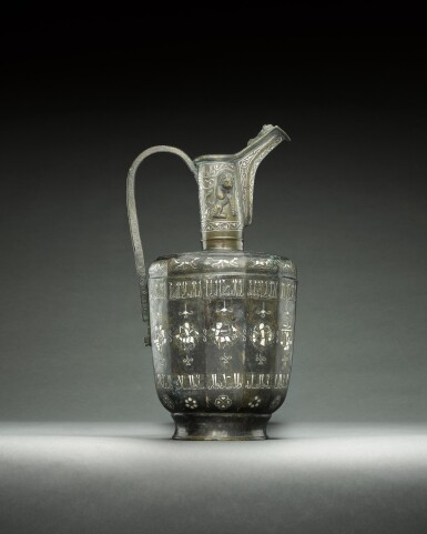 View full screen - View 1 of Lot 97. A Khurasan silver-inlaid ewer, Herat, 12th century.