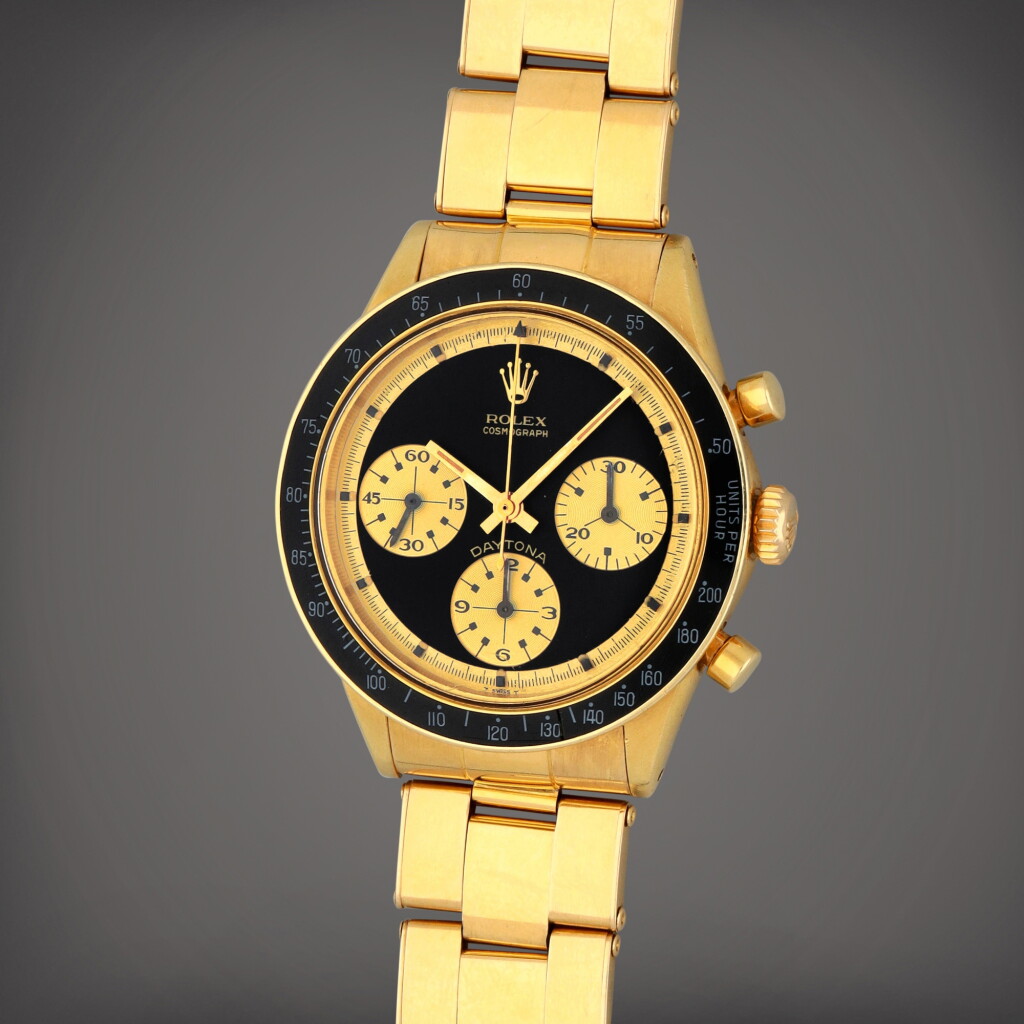View full screen - View 1 of Lot 119. Daytona 'John Player Special', Reference 6241 | A yellow gold chronograph wristwatch with bracelet | Circa 1969 | 勞力士 | Daytona 'John Player Special' 型號6241 | 黃金計時鏈帶腕錶,製作年份約1969.