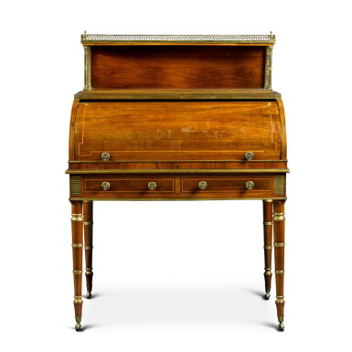 View full screen - View 1 of Lot 295. A Regency mahogany, boxwood- and ebony-strung cylinder desk, circa 1800 in the manner of John McLean.