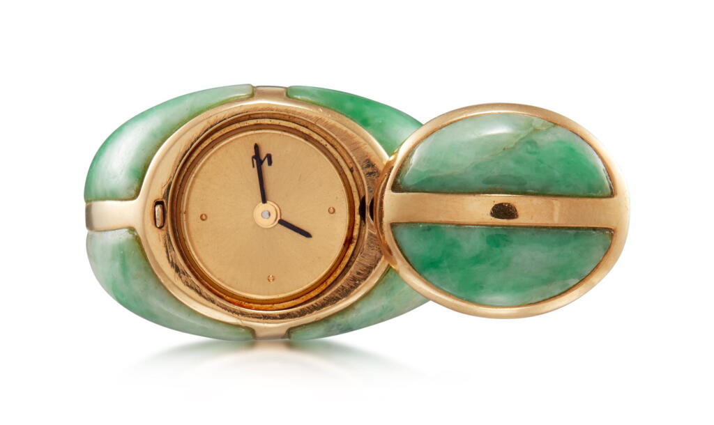 View full screen - View 1 of Lot 8077. MAUBOUSSIN | A YELLOW GOLD AND JADE-SET RING WATCH, CIRCA 1990.