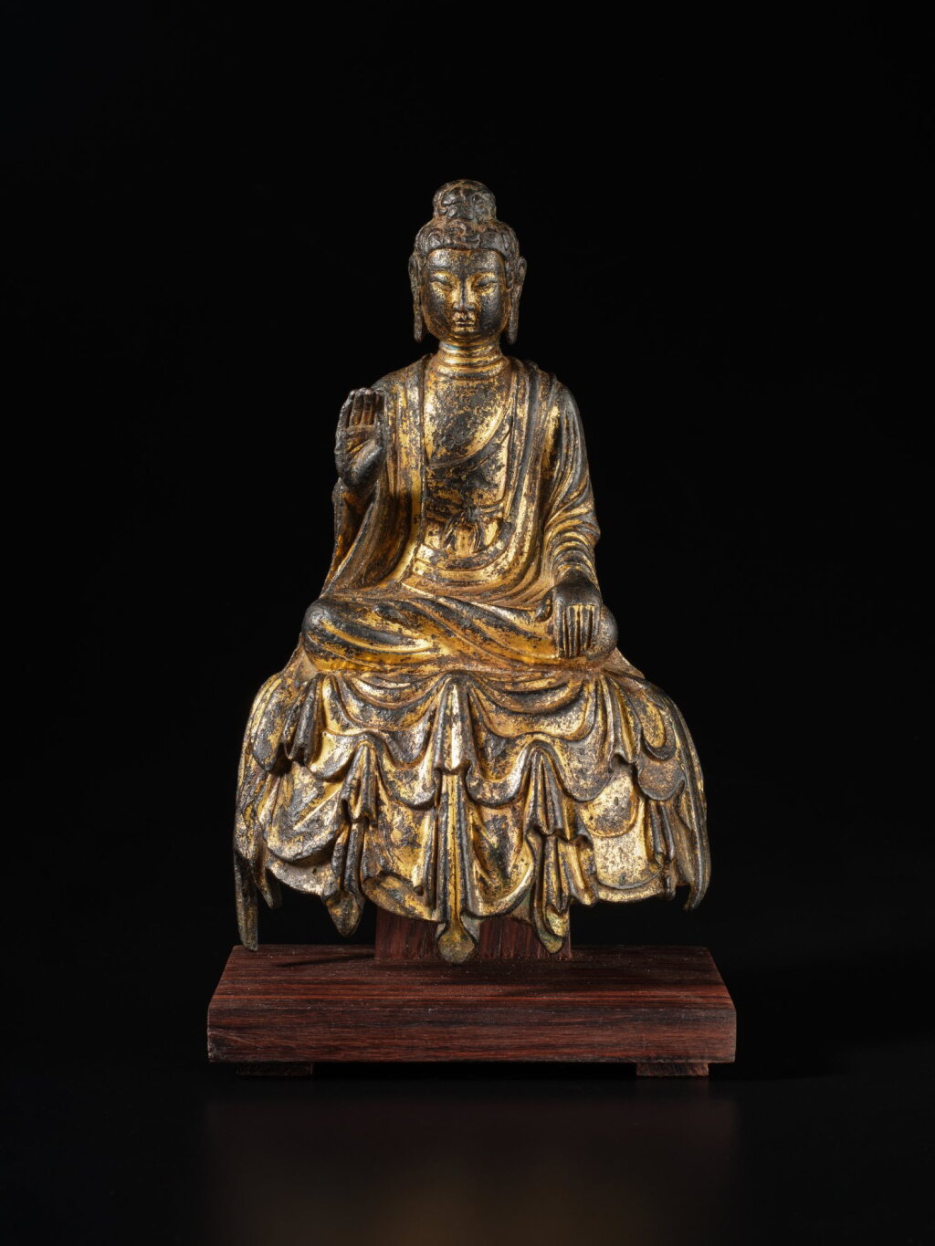 View full screen - View 1 of Lot 126. A gilt-bronze figure of Buddha, Tang dynasty | 唐 銅鎏金佛坐像.