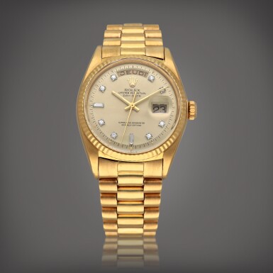 View full screen - View 1 of Lot 566. Day-Date, Reference 1803 | A yellow gold and diamond-set wristwatch with day, date and bracelet | Circa 1973.