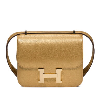 View full screen - View 1 of Lot 17. Limited Edition Doré Chèvre Chamkilight Metallic Mini Constance 18 Permabrass Hardware, 2025.