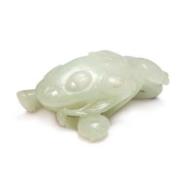 View full screen - View 1 of Lot 648. A white jade carving of a three-legged toad, Qing dynasty, 19th / 20th century | 清十九 / 二十世紀 白玉雕金蟾石榴把件.