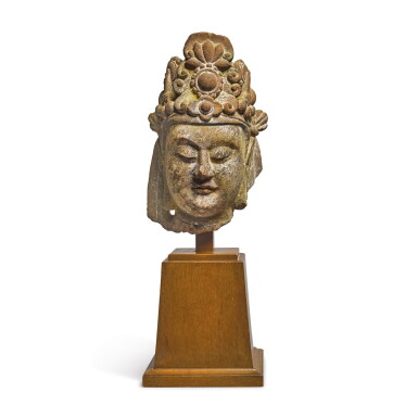 View full screen - View 1 of Lot 607. A CARVED LIMESTONE HEAD OF A BODHISATTVA, SUI DYNASTY.