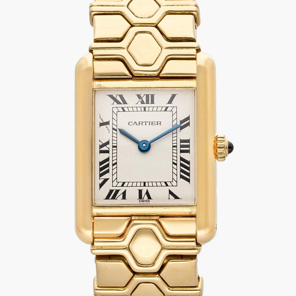 View full screen - View 1 of Lot 690. Tank Louis | A yellow gold wristwatch, Circa 1990.