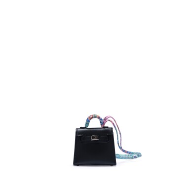 View full screen - View 1 of Lot 152. Black Tadelakt Micro Mini Twilly Kelly Bag Charm Palladium Hardware, 2021.