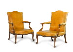 A pair of late George II carved mahogany armchairs, circa 1755-60, almost certainly by Thomas Chippendale