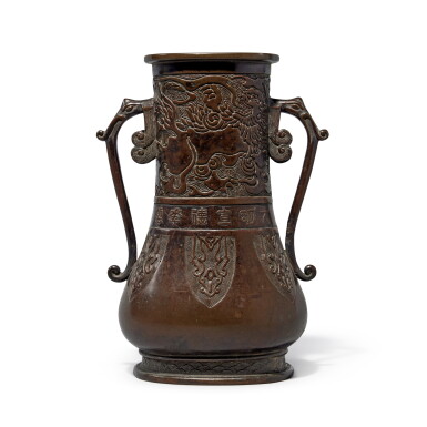 View full screen - View 1 of Lot 91. An archaistic bronze handled vase, 19th / 20th century | 十九 / 二十世紀 仿古雙耳銅壺.