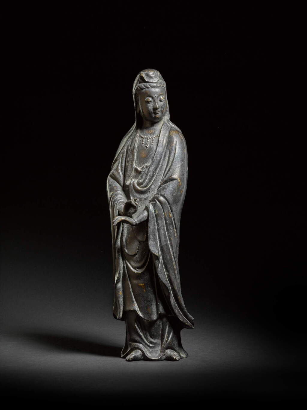 View full screen - View 1 of Lot 111. A silver-inlaid bronze figure of Avalokiteshvara, 17th century.