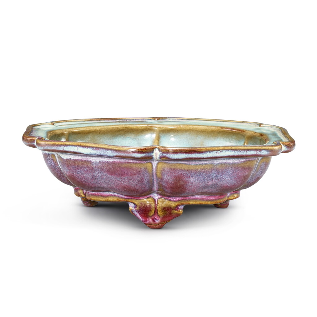 View full screen - View 1 of Lot 3670. A rare Junyao hexalobed tripod narcissus bowl, Early Ming dynasty | 明初 鈞窰玫瑰紫釉三足葵式水仙盆 「七」字款.