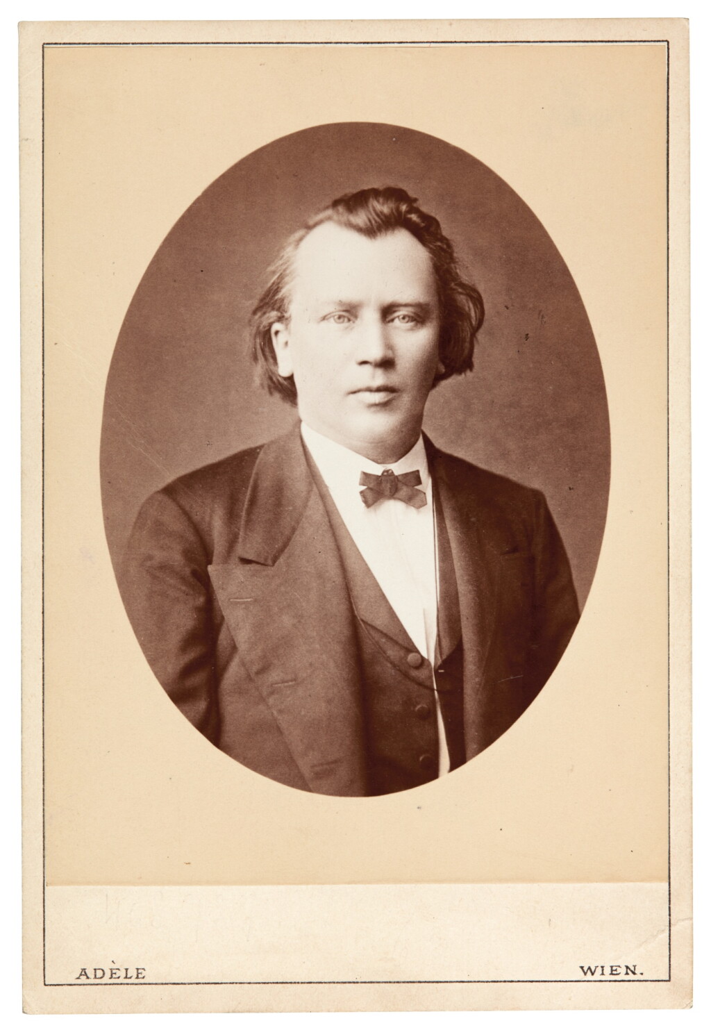 View full screen - View 1 of Lot 125. Johannes Brahms. Cabinet-style photographic portrait signed in pencil on the reverse, nineteenth century.