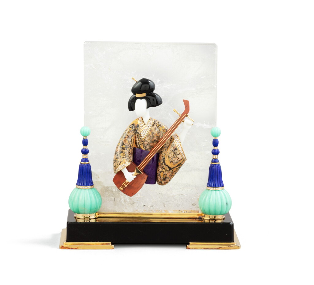 View full screen - View 1 of Lot 30. A French obsidian, silver-gilt, rock-crystal and hardstones figure representing a geisha musician, Mellerio, Paris, 2004 | Sculpture en obsidienne, vermeil, cristal de roche et pierres dures représentant une geisha musicienne par Mellerio, Paris, 2004.