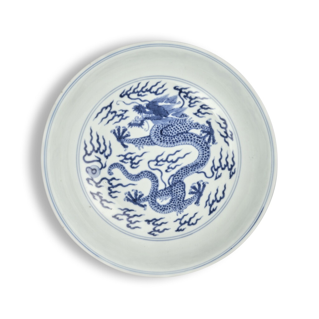 View full screen - View 1 of Lot 357. A fine blue and white 'dragon' dish, Seal mark and period of Qianlong | 清乾隆 青花雲龍趕珠紋盤 《大清乾隆年製》款.