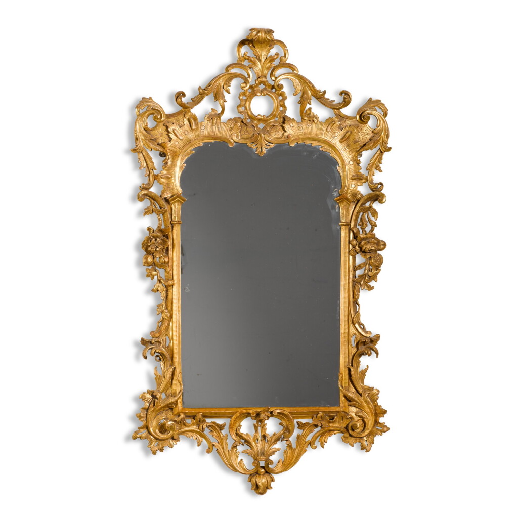 View full screen - View 1 of Lot 21. A George II carved giltwood mirror, possibly Irish, mid-18th century.