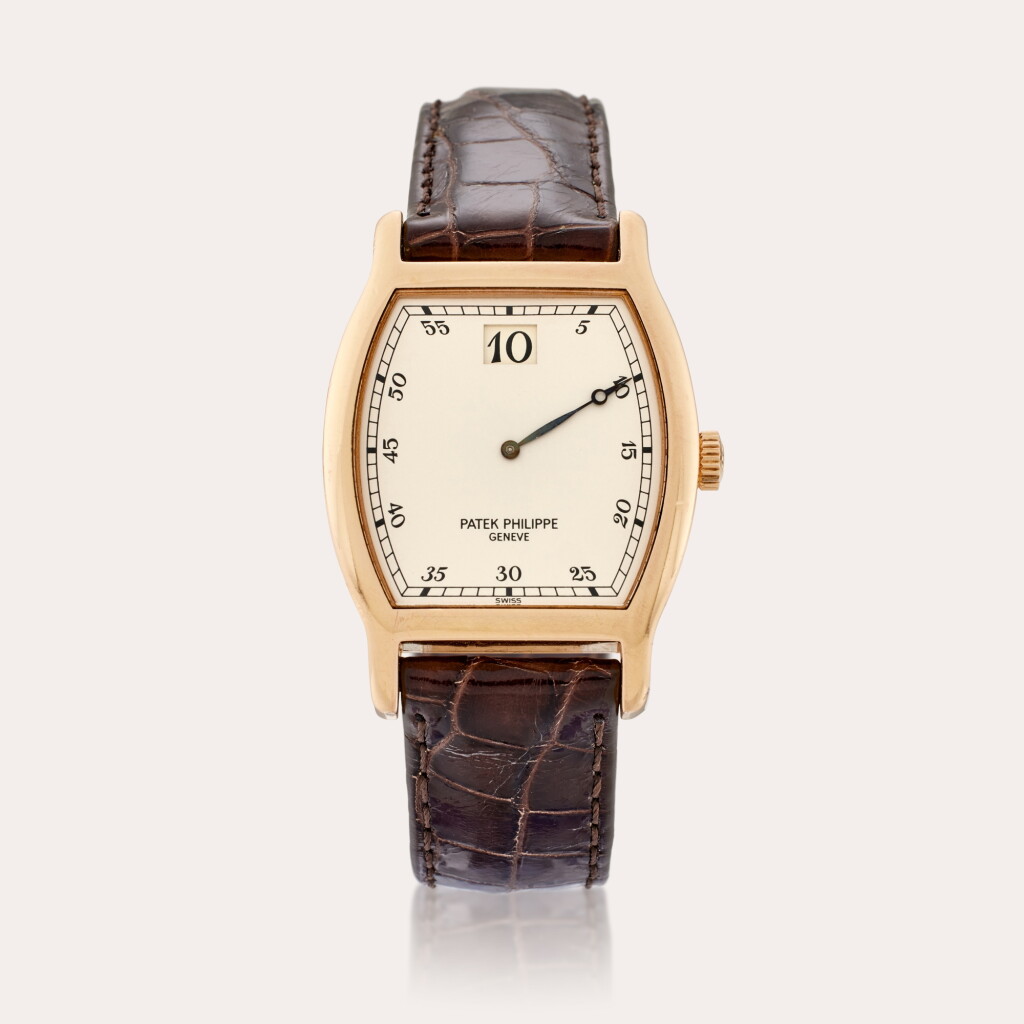 View full screen - View 1 of Lot 190. Reference 3969R Jump Hour | A limited edition pink gold tonneau shaped jump hour wristwatch, Made to commemorate the 150th Anniversary of Patek Philippe, Made in 1989.