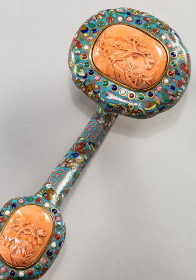View full screen - View 1 of Lot 48. A coral inlaid cloisonné enamel ruyi sceptre, Qing dynasty, 18th-19th century | 清十八至十九世紀 掐絲琺琅嵌寶如意.