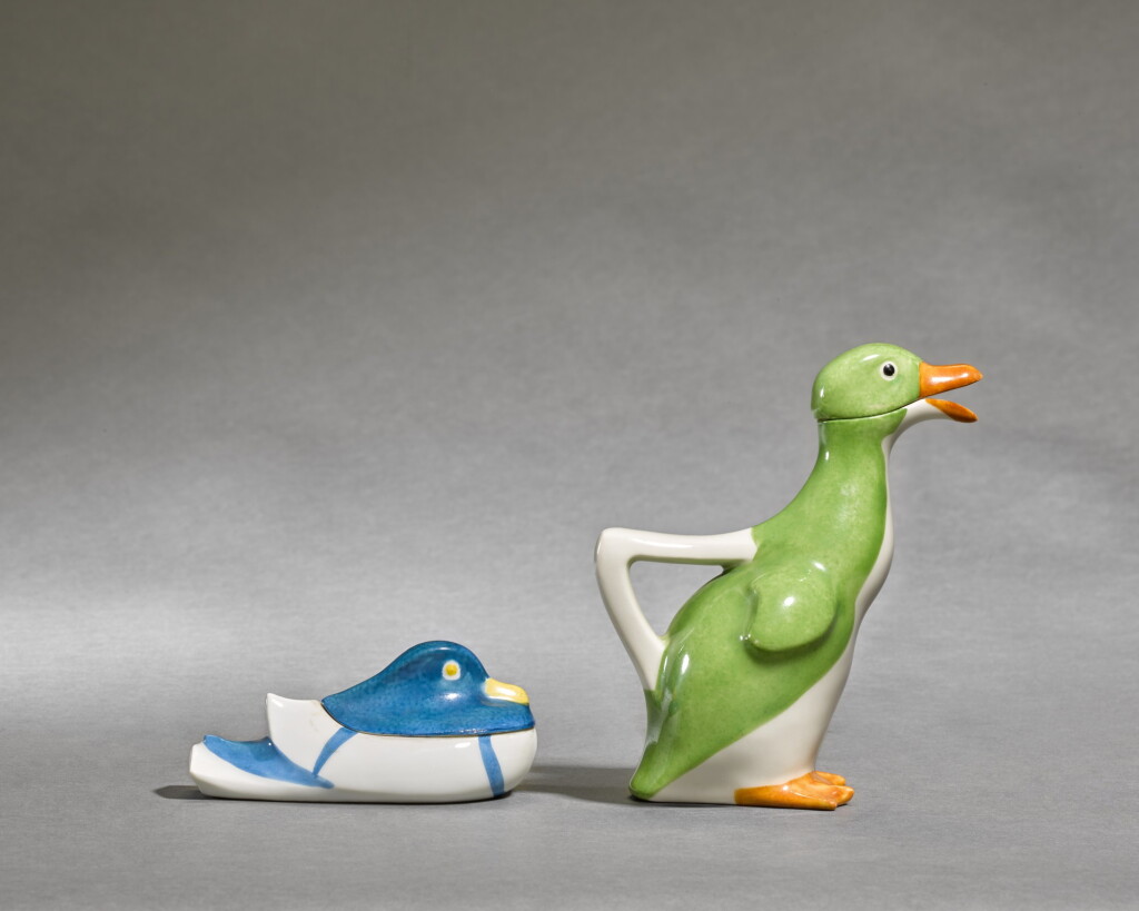 View full screen - View 1 of Lot 116. Duckling jug and cover, and Mandarin box and cover.