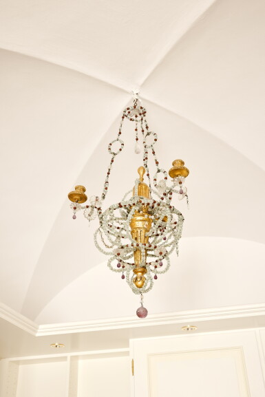 View full screen - View 1 of Lot 657. A pair of Venetian giltwood and glass chandeliers, 18th century.