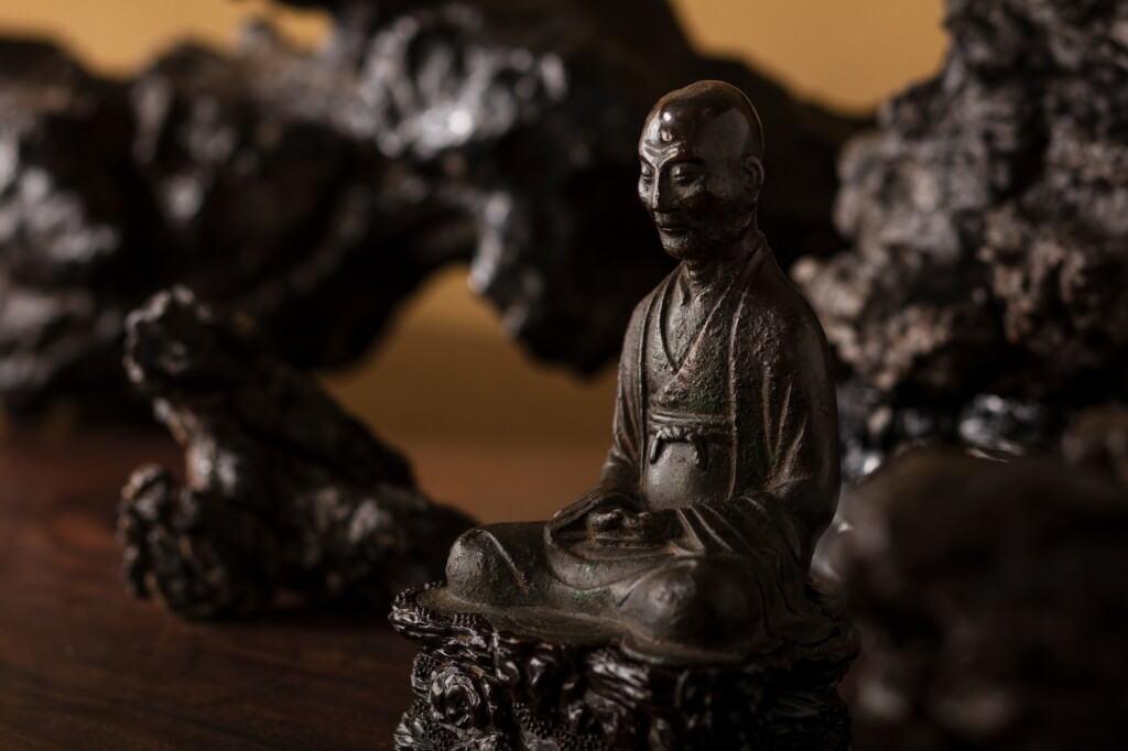 View full screen - View 1 of Lot 1528. A bronze figure of a seated Buddhist master, Song dynasty | 宋 銅祖師坐像.
